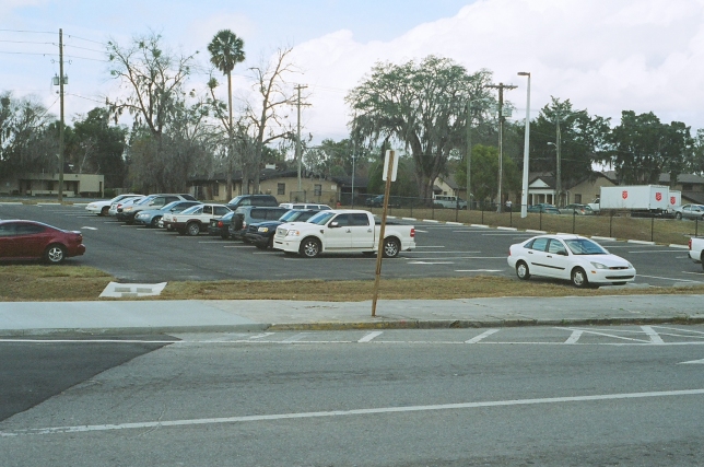 Site of the former Toffeletti's Hardware Store - now a parking lot provided by the City of Ocala as part of an incentive package for a Call Center business which has recently located in that part of town.